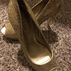 Size 8 gold Guess High heels